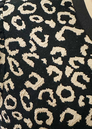 Animal print puff sleeve top with striped collar and cuffs