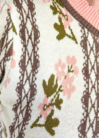 Short sleeve sweater with chocolate brown vine and soft pink florals-soft Pink Scallop trim on bottom hem, sleeve and neck. 
