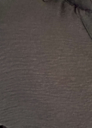 Black collared top with v-neckline