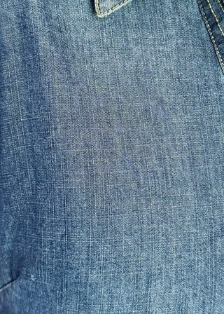Close up women's short sleeve vneck denim dress with pockets
