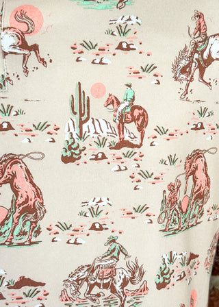 men's polo shirt with cowboy printed pictures all over it