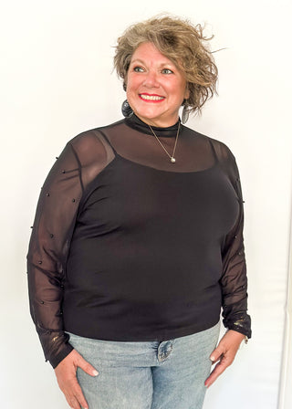 Mock neck mesh black top with black beaded sleeves.