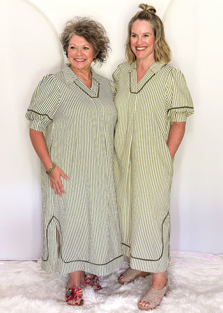 Vertical Stripe Dress in a relaxed silhouette with collar, solid olive contrast detail and pockets.