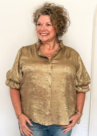 Shimmer gold lightweight button up blouse with collared neckline and ruched sleeves.