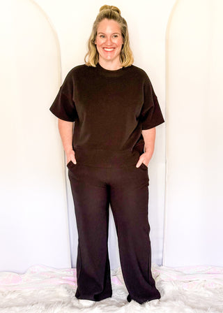 Two piece ribbed outfit in Black featuring boxy top and wide leg pants