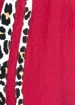 dolman short sleeve top in garnet color with double leopard stripe v-neck