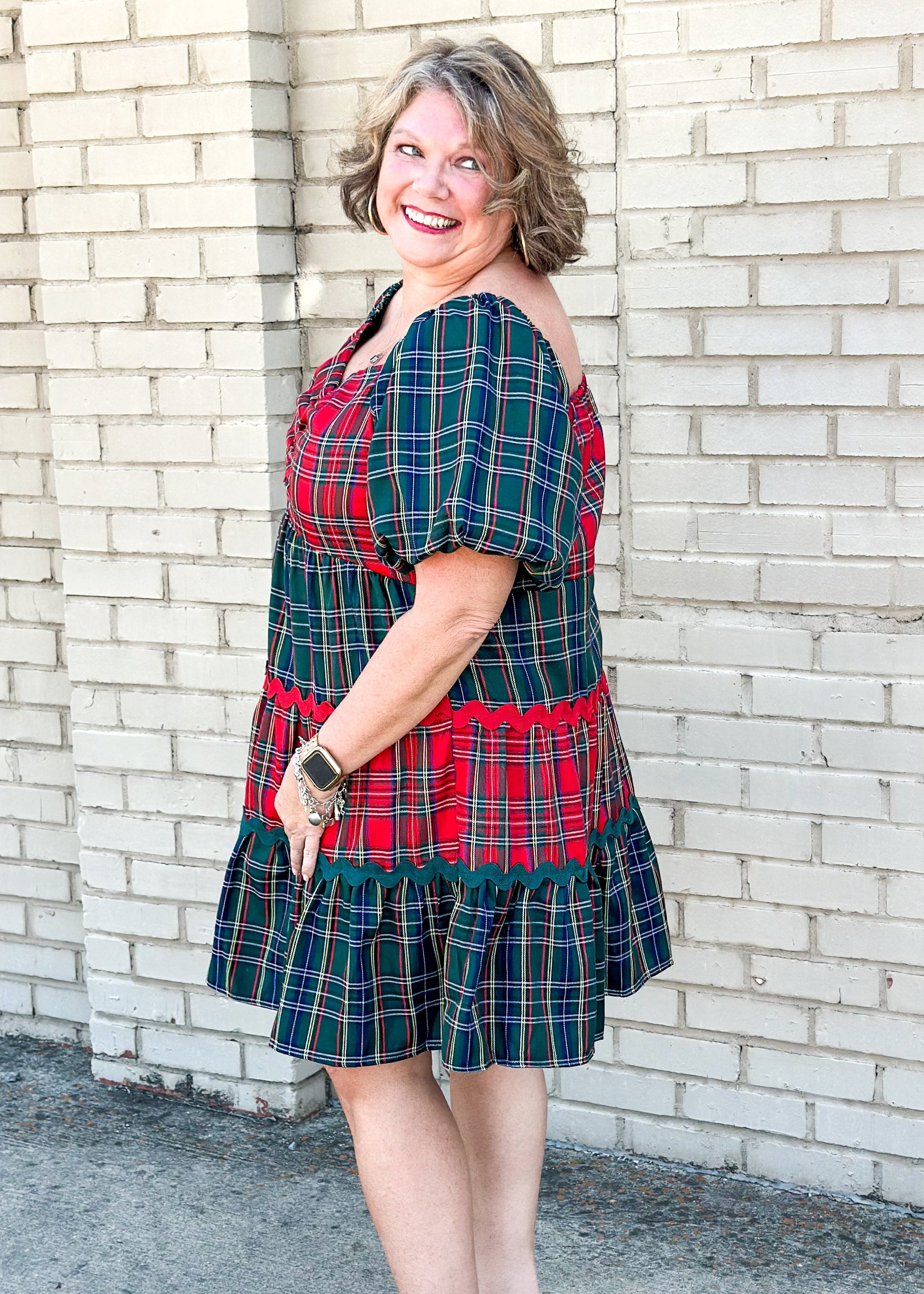 red and green tiered plaid dress - sleeves are green and alternating tiers of red and green plaid with red or green rick rack in between tiers