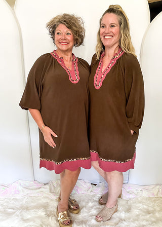 Brown ribbed v-neck dress with pink scallop trim and leopard print contrast. 