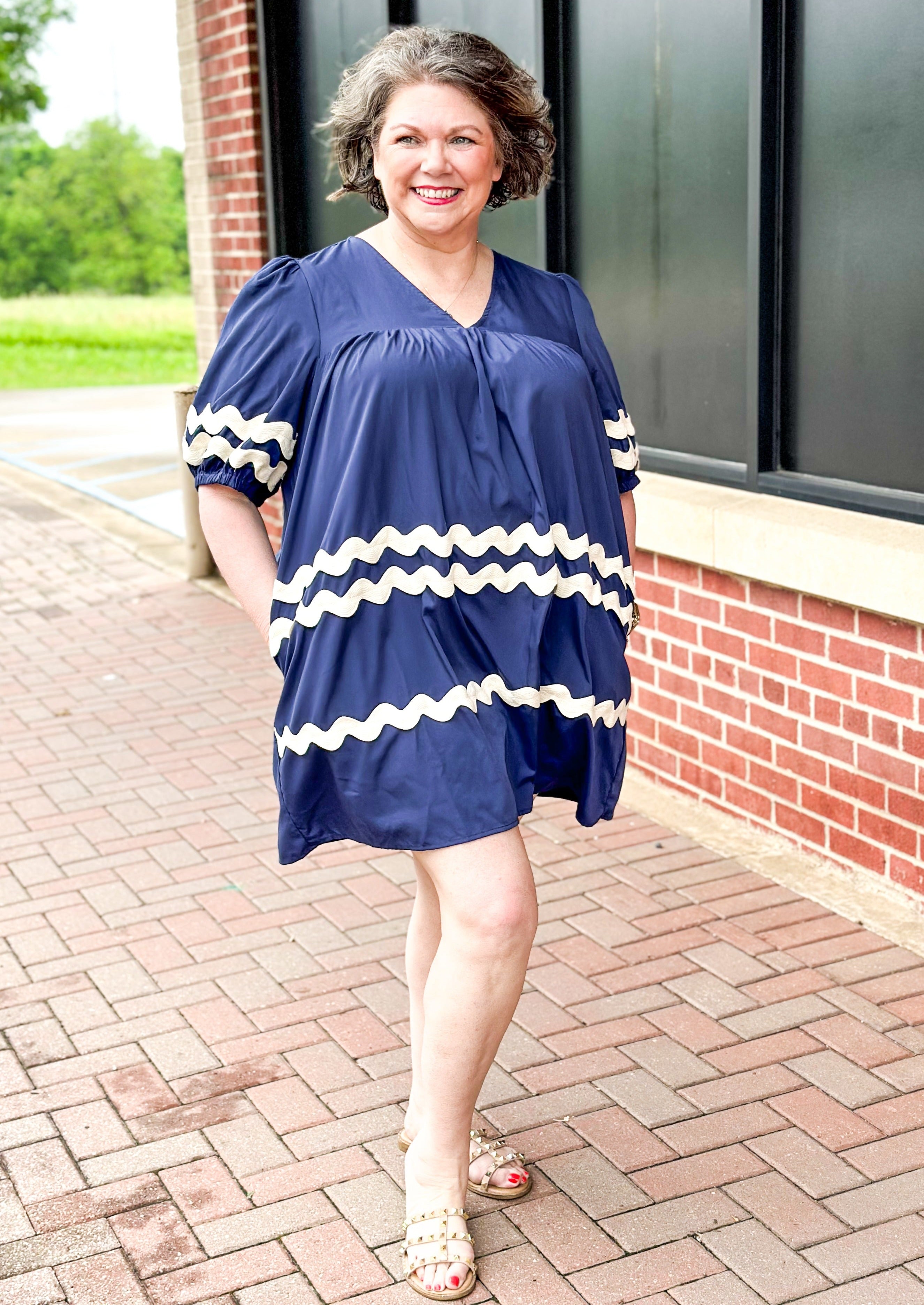 Navy Rick Rack v-neck short sleeve dress - cream rick rack around bottom of short sleeves and on the front only of the dress - pockets