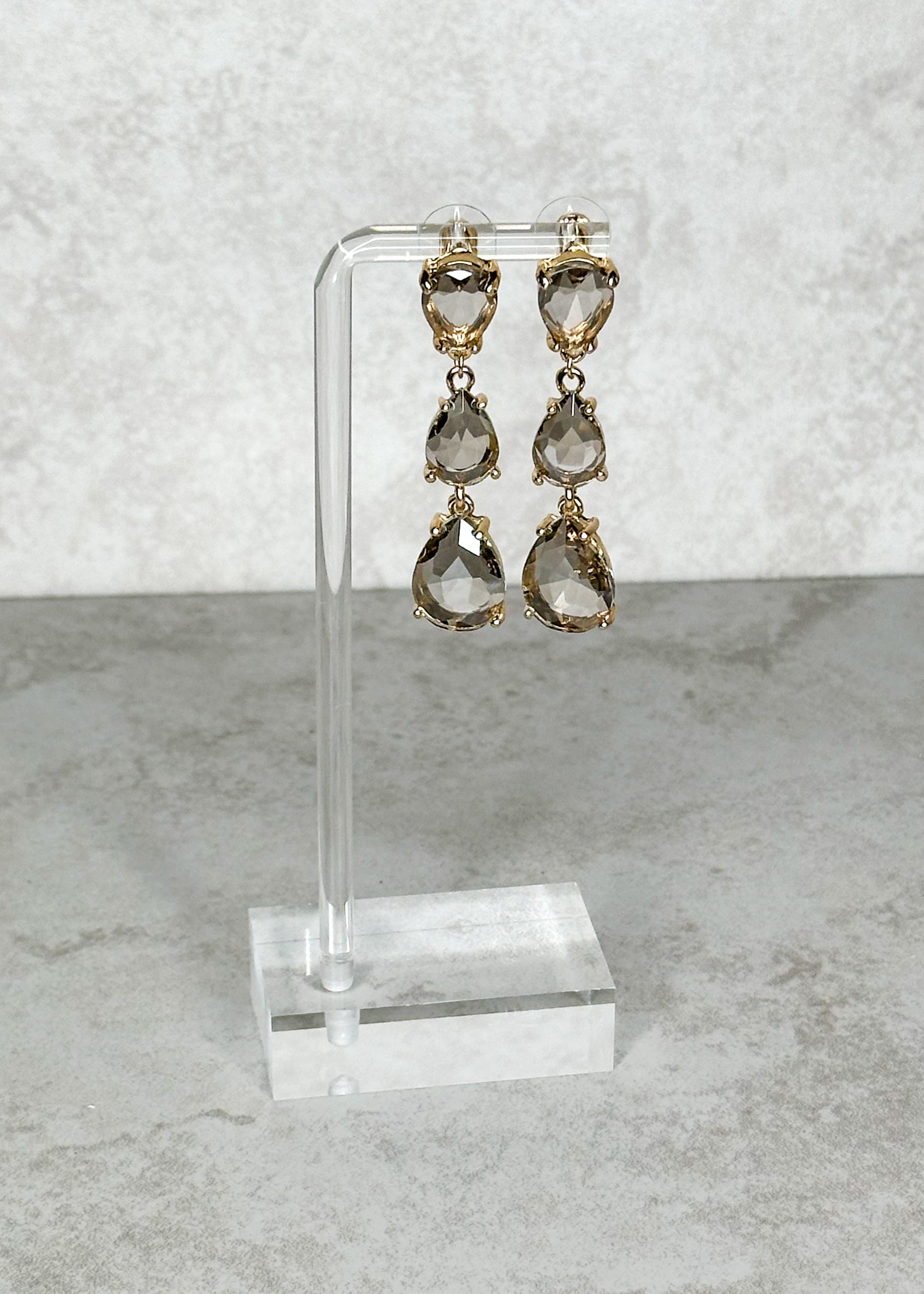 Three tier gray with gold hardware post back earrings.