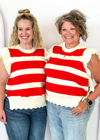 Red and cream stripe ruffle sleeve sweater. 2 Cream ribbon ties on each side.