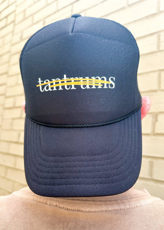 Black trucker hat with mesh back.  Tantrums in white lettering on the front. 