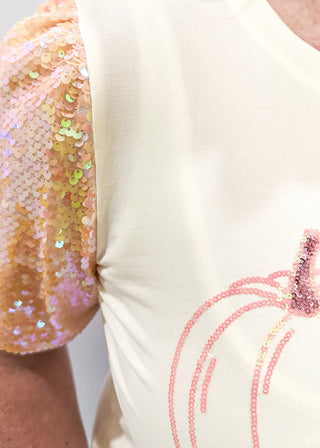 Ivory short sleeve top with sequin sleeves.  3 sequin pumpkins on the front. 