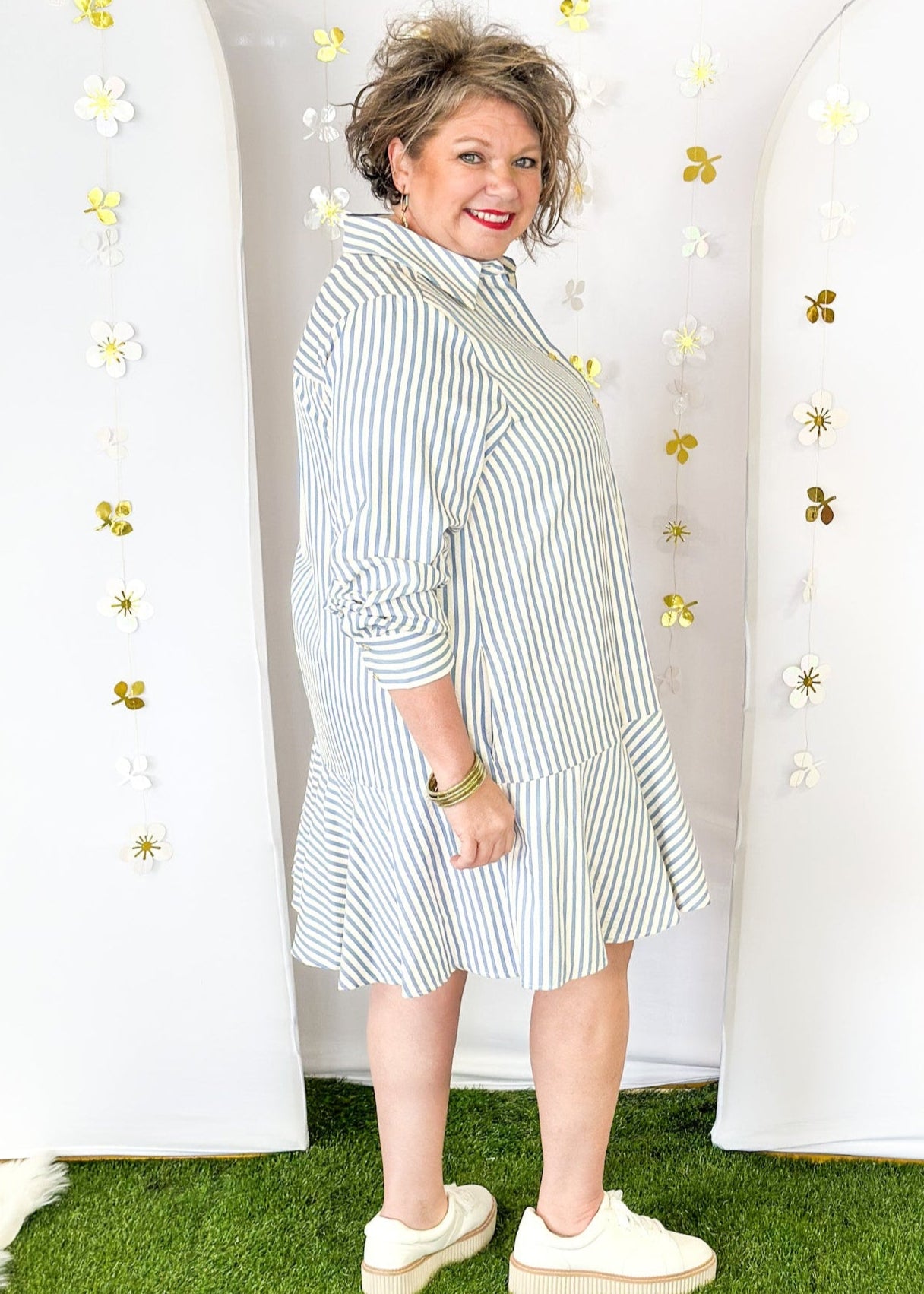 Cream and blue vertical striped long sleeve dress with collar.  Button closure down the front with lining and pockets.