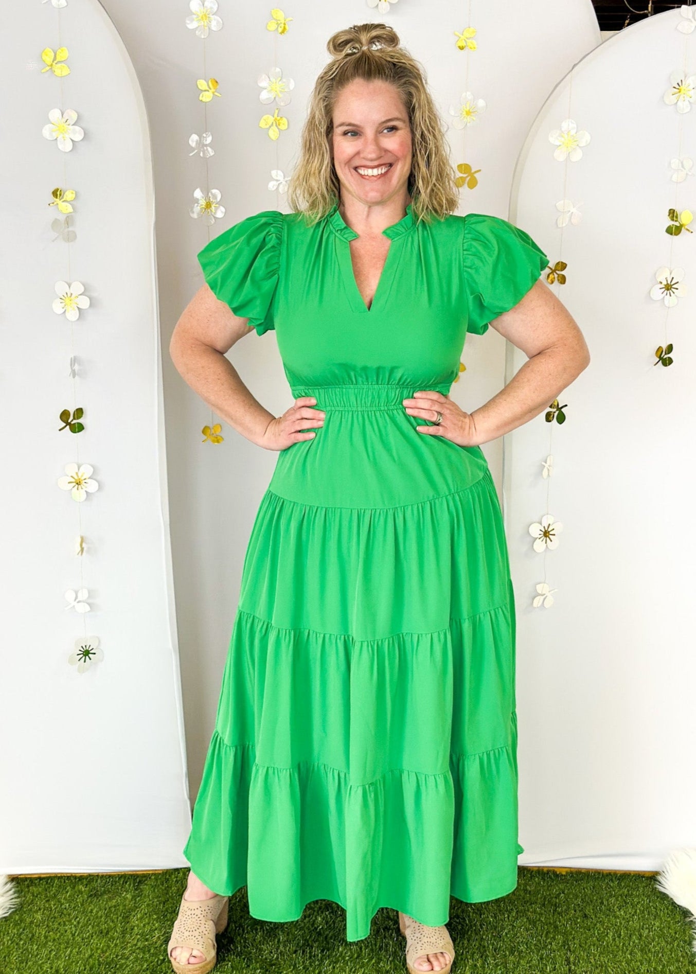 Solid green tiered maxi dress with puff sleeve. and cinched waist.  V-neck with small ruffle collar. Lined.