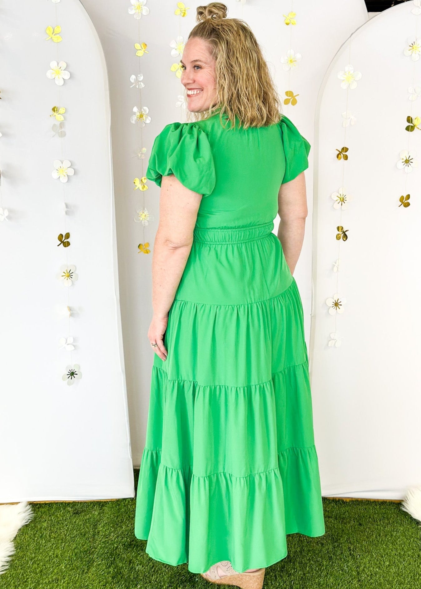 Solid green tiered maxi dress with puff sleeve. and cinched waist.  V-neck with small ruffle collar. Lined.