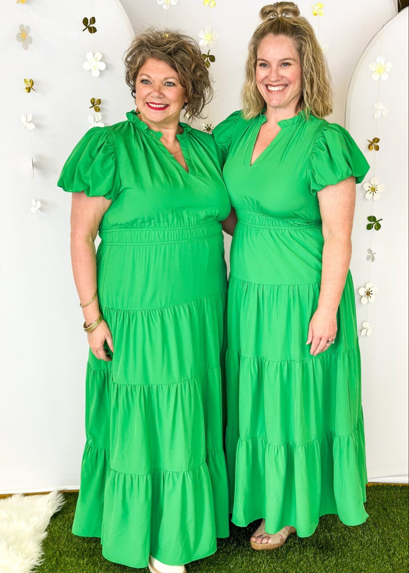 Solid green tiered maxi dress with puff sleeve. and cinched waist.  V-neck with small ruffle collar. Lined.