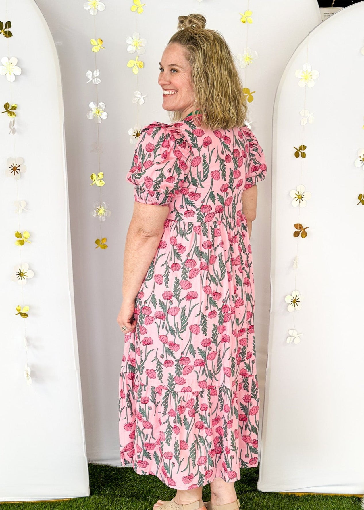 Pink and green floral midi dress.  V-neck with pink and green striped collar.  Puff sleeve-lined with pockets. 