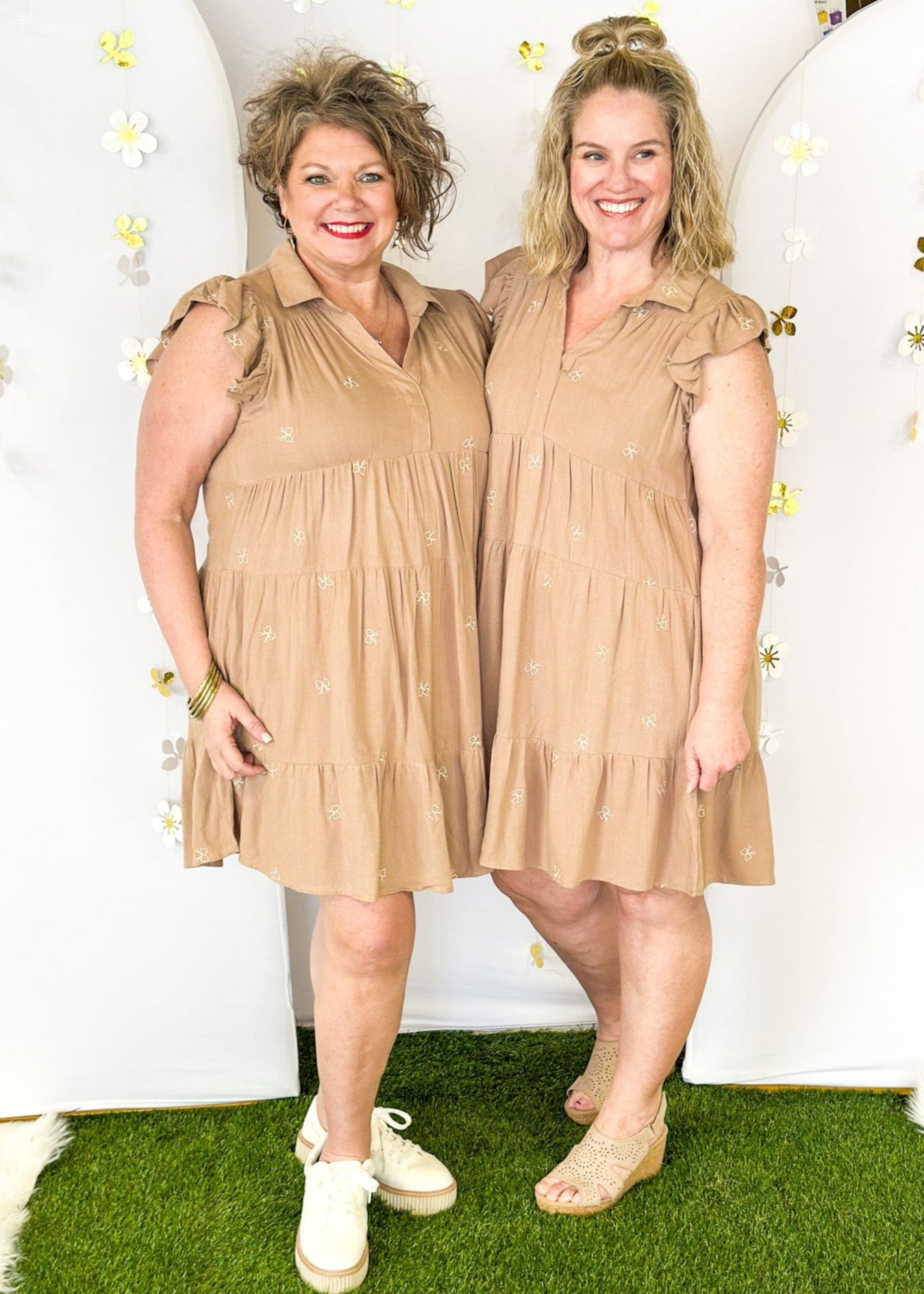 Tiered,V neck collar dress in linen with small ivory bows-small ruffle sleeve. 