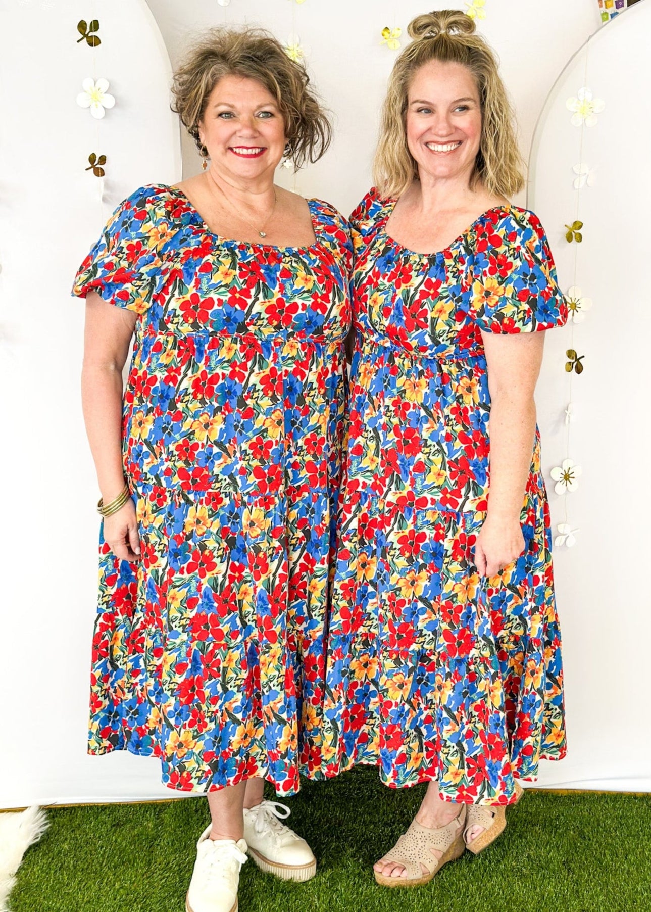 Short Sleeve midi dress with square neck line.  Bright florals in Red, Blue and yellow. 