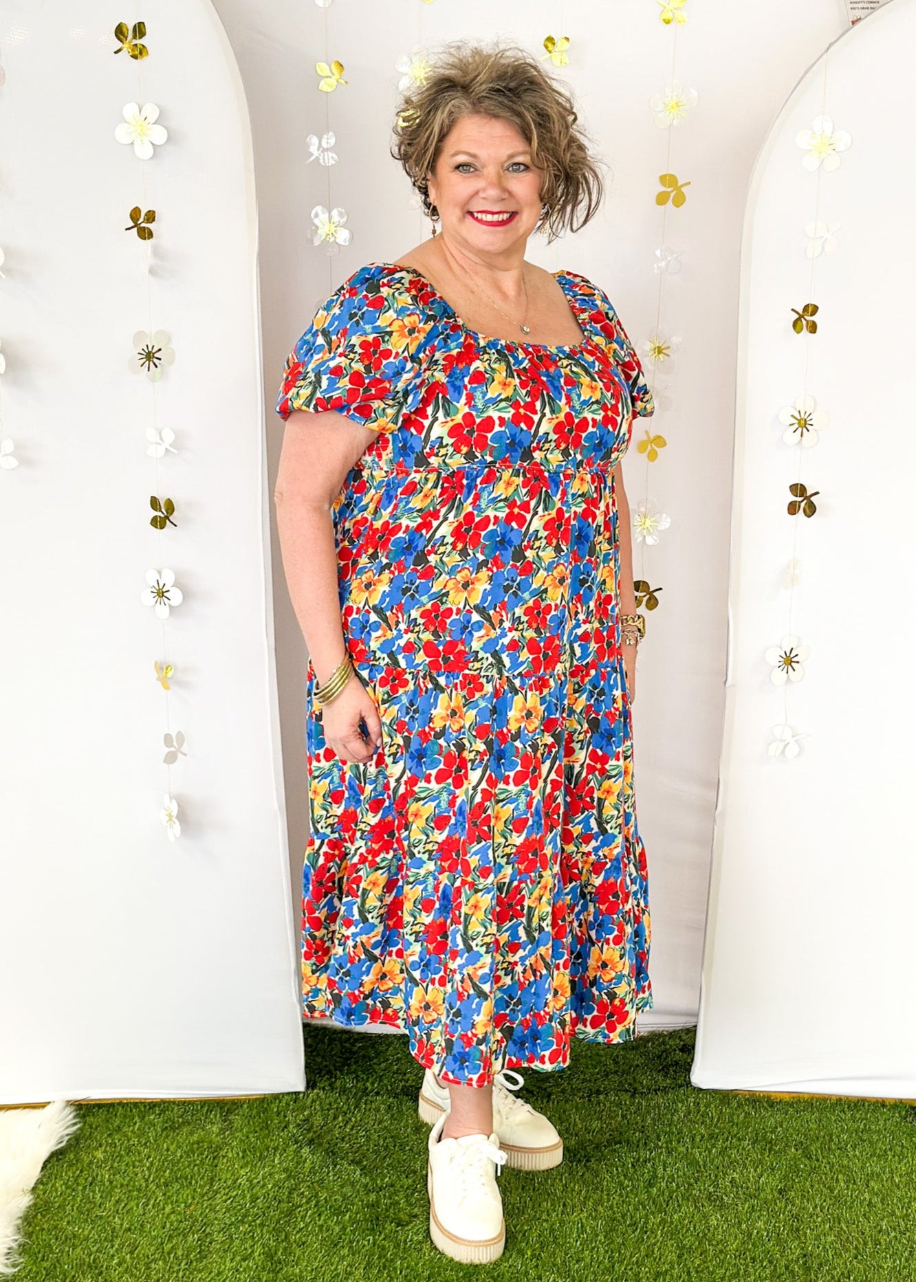 Short Sleeve midi dress with square neck line.  Bright florals in Red, Blue and yellow. 