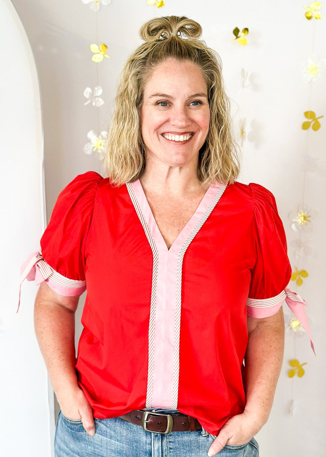 red short puff sleeve top with v-neck - pink banding around cuff and neck and down the front accented with white/pink stripes