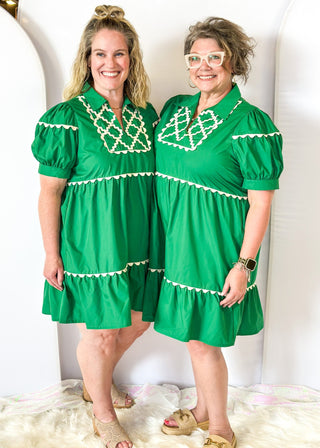 kelly green tiered babydoll dress with green scalloped trim around arm, below bust and on single bottom tier - scalloped detail around v-neck - collar