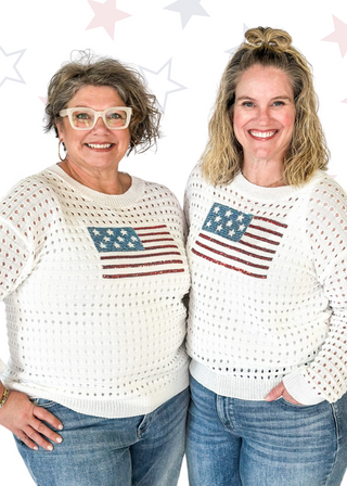 long sleeve white open knit pullover sweater with sequin american flag on the front