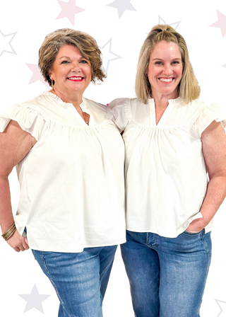 notched v-neck ruffle short sleeve top with ruffle neck and seam above the chest - white