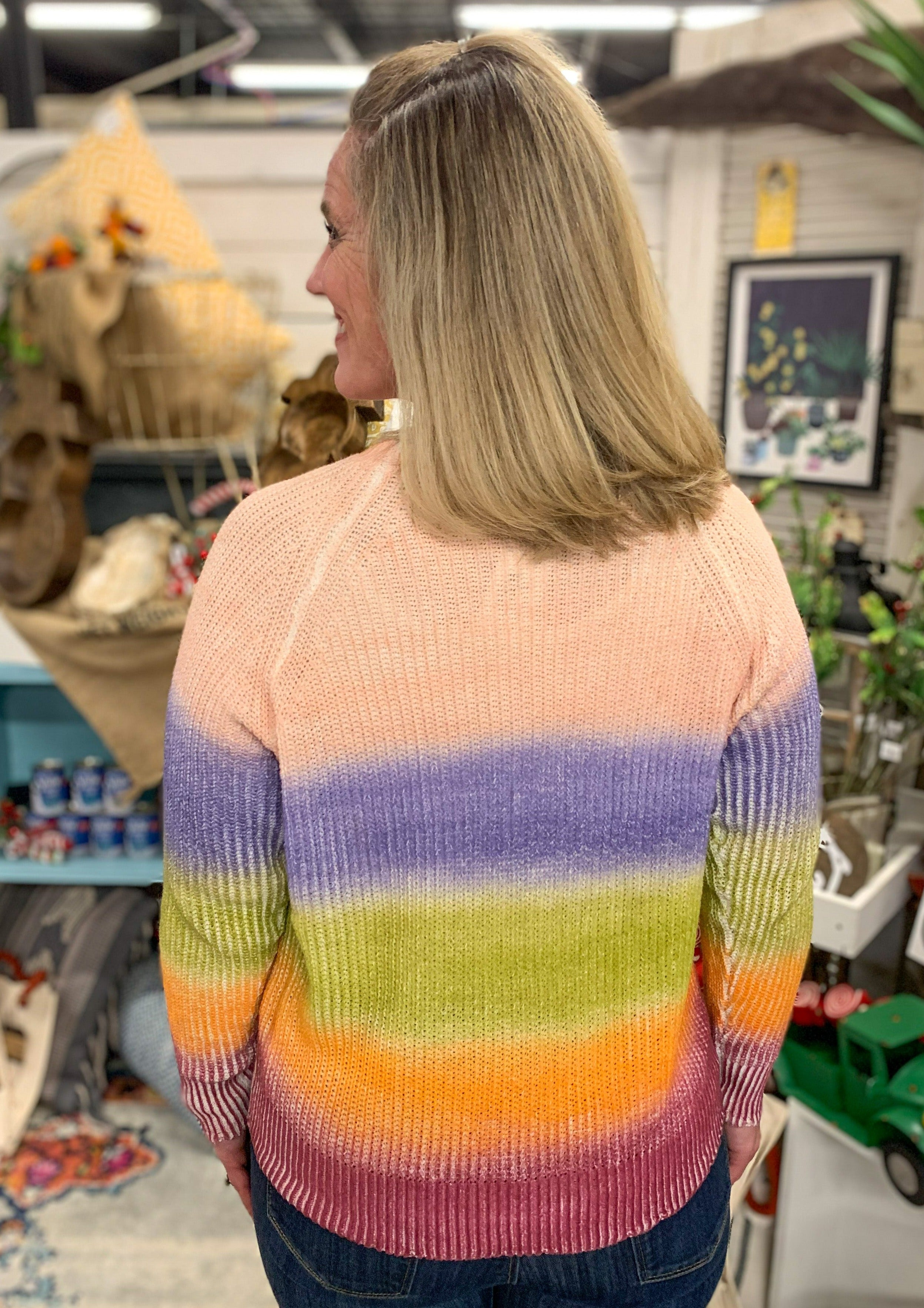 Back of Tie Dye Color Blocked Sweater with a small weave. Colors from top to bottom are light pink, purple, green, orange, and maroon.