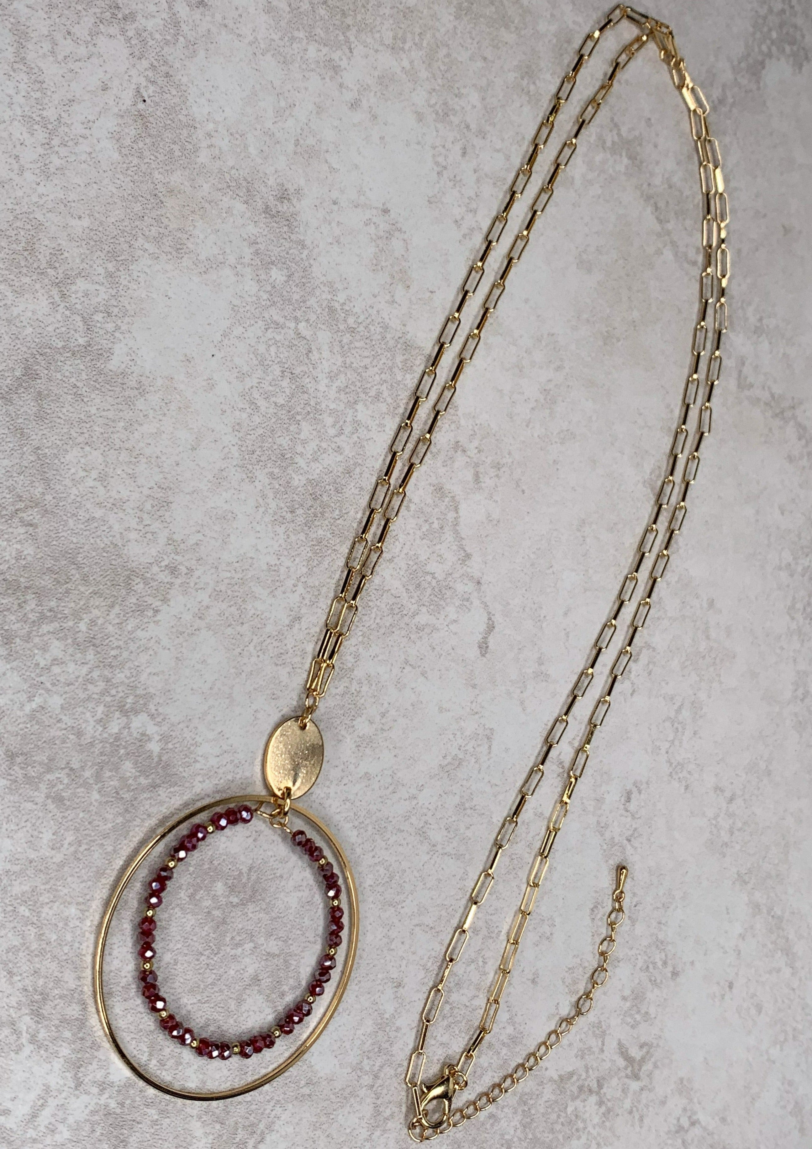 Gold Circle Necklace with Wine Beads